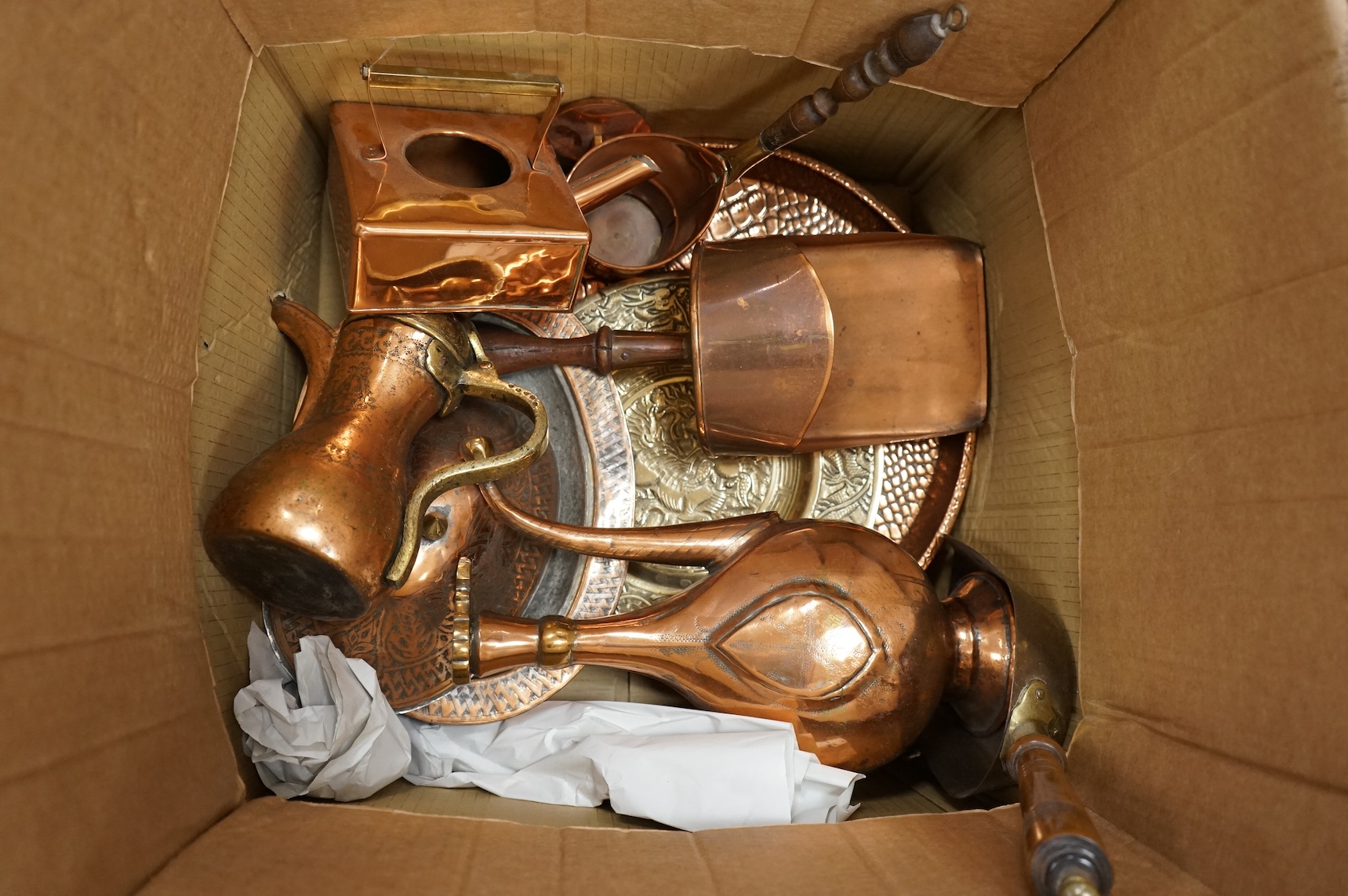 A group of metalware to include brass trays and copper warming pans